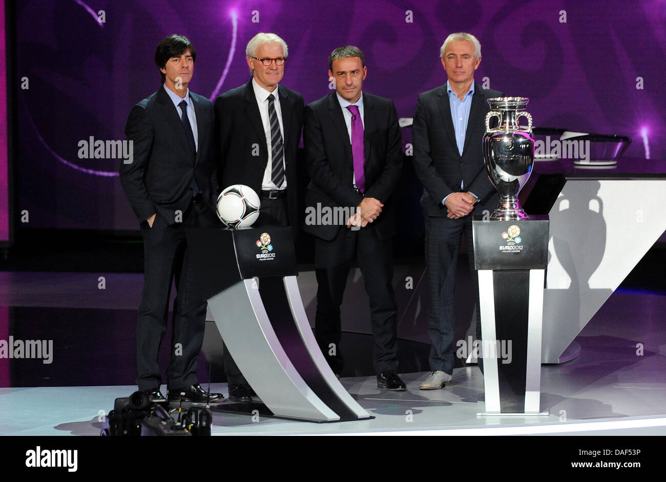 The coaches of group B Joachim Löw (Germany), Morton Olson (Denmark), Paulo Bento (Portugal) and Bert van Marwijk (Netherlands, from left to right)) stay at the stage during the final draw for the UEFA EURO 2012 soccer championships at the Palace of Arts in Kiev, Ukraine, 02 December 2012. The European soccer championships will take place from 08 June to 01 July 2012 in Poland and  Stock Photo