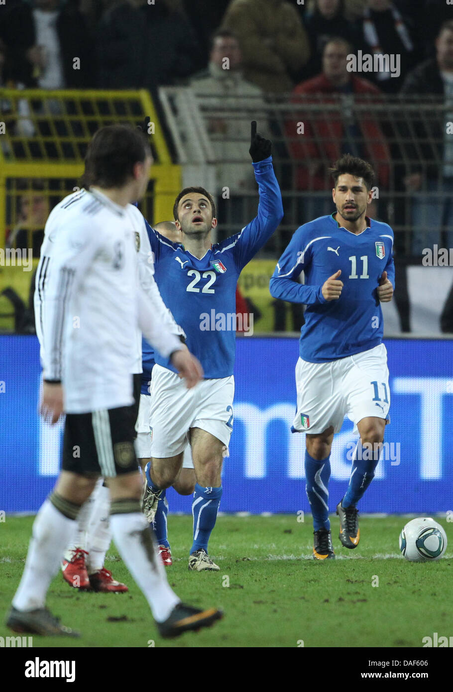Guiseppe Rossi (C) of Italy celebrates with Marco Borriello (R) after scoring the 1-1 during the friendly soccer match between Germany and Italy at Signal Iduna Park stadium in Dortmund, Germany, 09 February 2011. Photo: Friso Gentsch dpa/lnw Stock Photo
