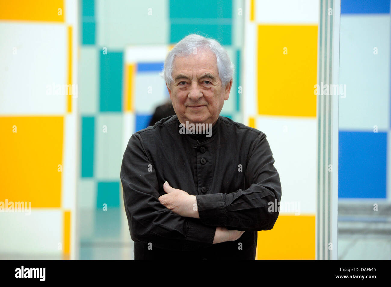 Artist Daniel Buren is pictured at his exhibition 'Allegro Vivace' at the Staatliche Kunsthalle Baden-Baden, that is on display from 12 February until 22 May 2011 in Baden-Baden, Germany, 10 February 2011. Buren exhibits various installations made of glas, mirrors and transparent coloured vinyl-foil. Photo: Uli Deck Stock Photo