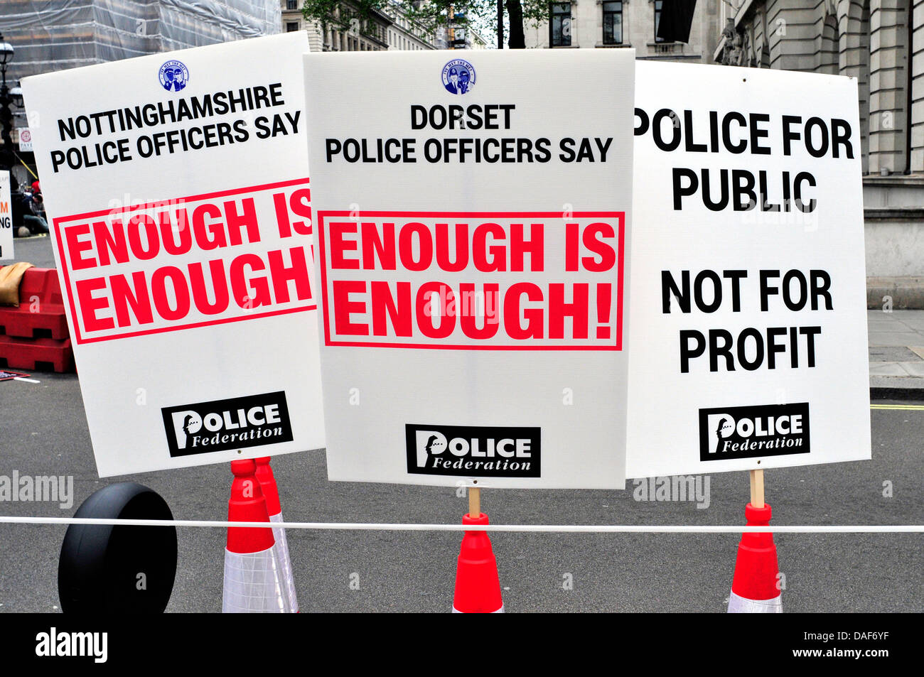 Banners left by off-duty police officers from different police forces. After their march against job cuts. London, UK Stock Photo