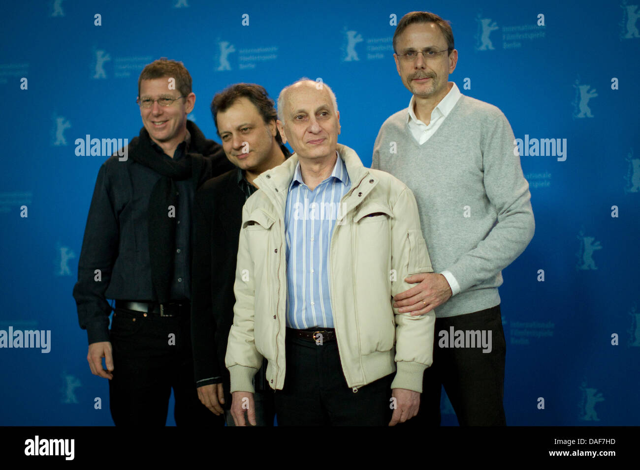French producer Philip Boeffard (L-R), 3D technician Rodolphe Chabrier, French director Michel Ocelot and producer Christophe Rossignon poses during the photocall for the animationsfilm 'Tales Of The Night' ('Les Contes De La Nuit') during the 61st Berlin International Film Festival in Berlin, Germany, 13 February 2011. The film runs in the competition of the International Film Fes Stock Photo