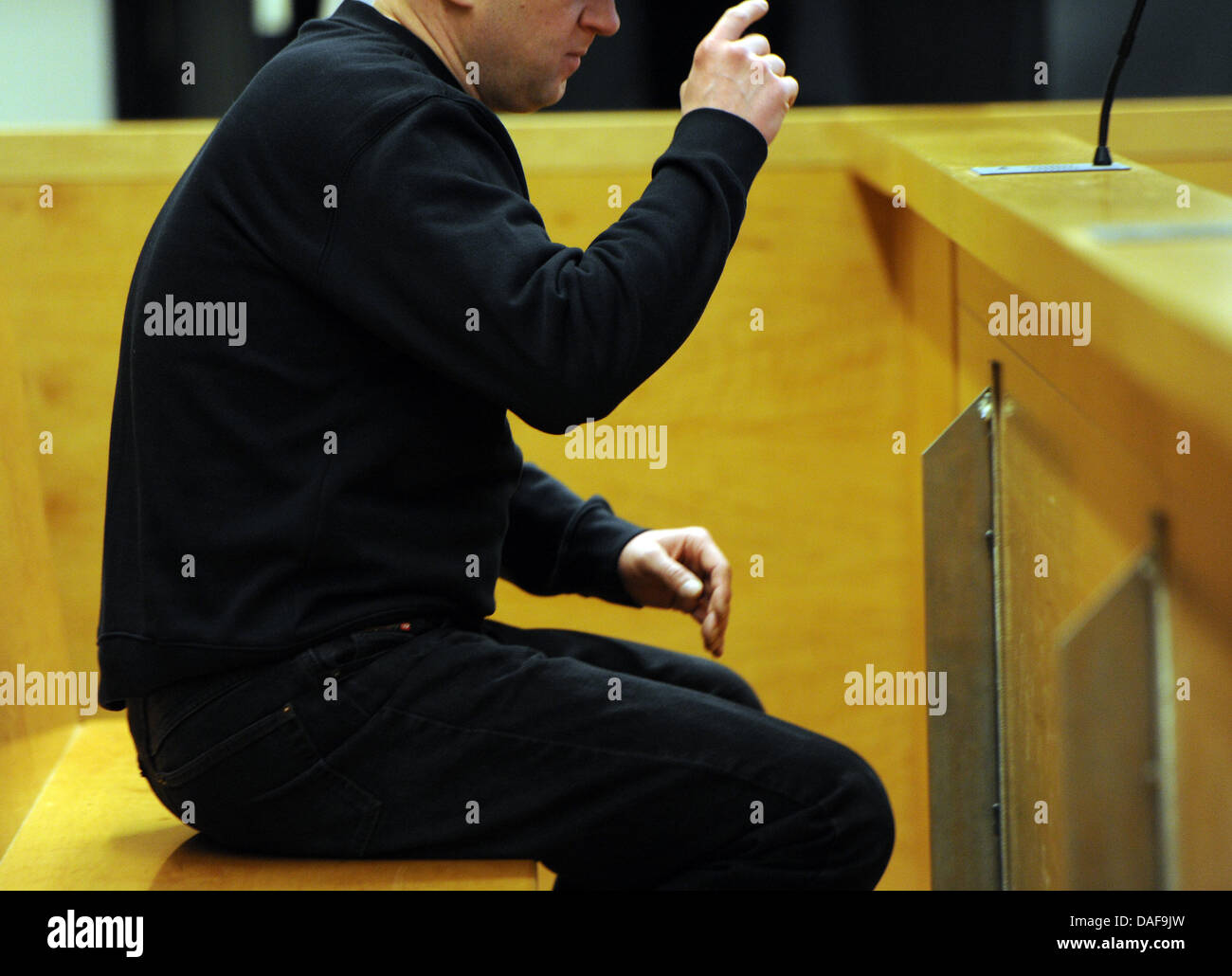 Defendant Holger  B. is in the dock in Hanover, Germany, 15 February 2011. The 43-year-old early-retired man is accused of having shot two Italian soccer fans to death in Hanover. Photo: CAROLINE SEIDEL Stock Photo