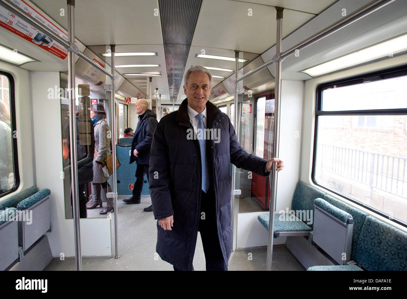 German Minister of Transport Peter Ramsauer   stands in a Berlin S- Bahn suburban train prior to a visit at a plant of the Canadian rail car producing company Bombardier in Henningsdorf, Germany, 11 February 2011. Ramsauer got an update on trains such as 'Talent 2'. Photo: Martin Foerster Stock Photo