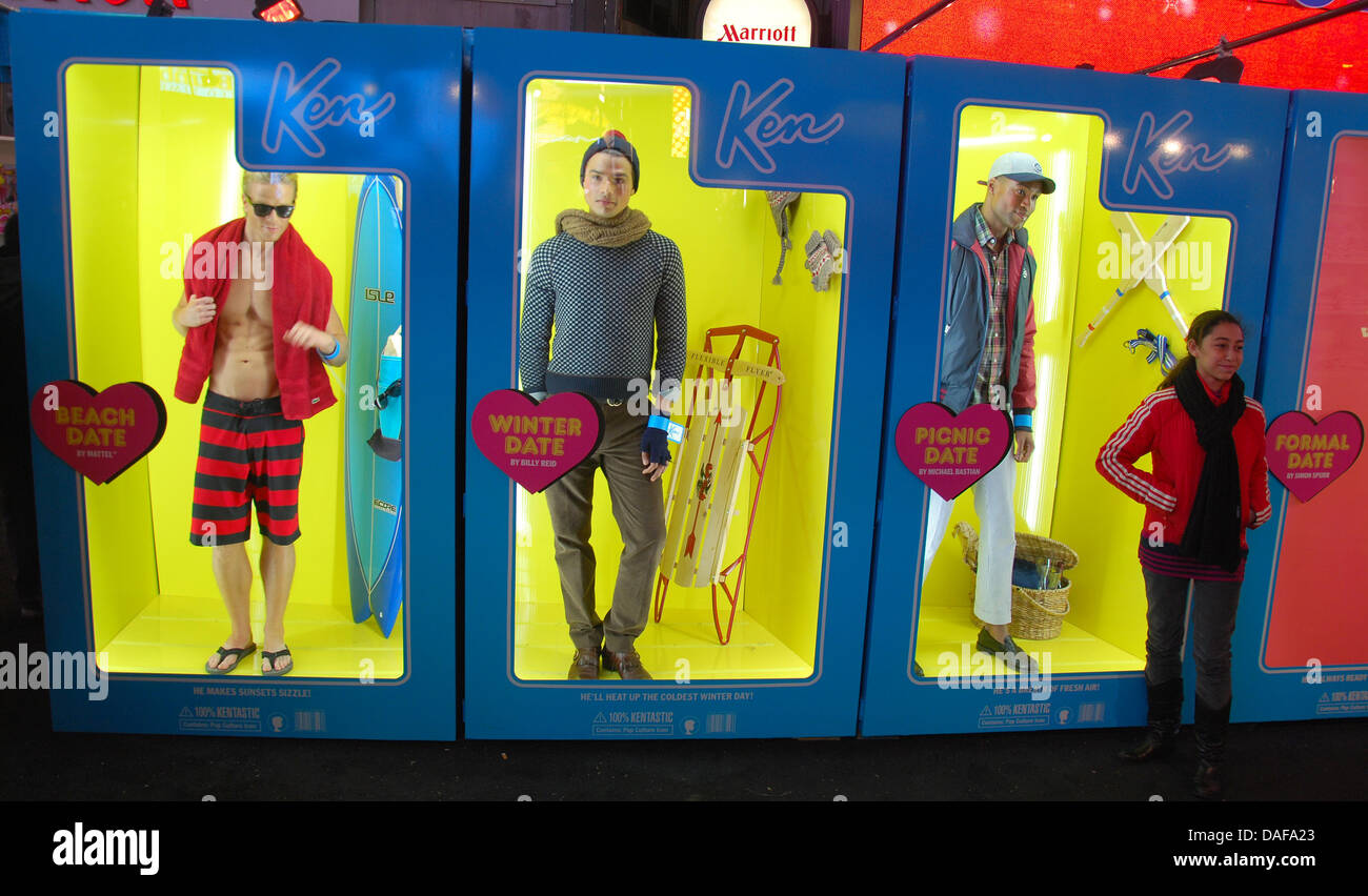 Young male models in plastic boxes pose as advertisement for Barbies male  counterpart Ken in a marketing campaign by the company Mattel on Time  Square in New York, USA, 14 February 2011.