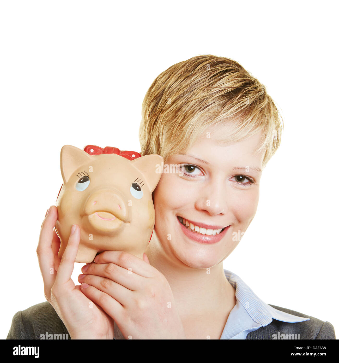 Business woman holding a piggy bank on the hands, isolated over a white ...