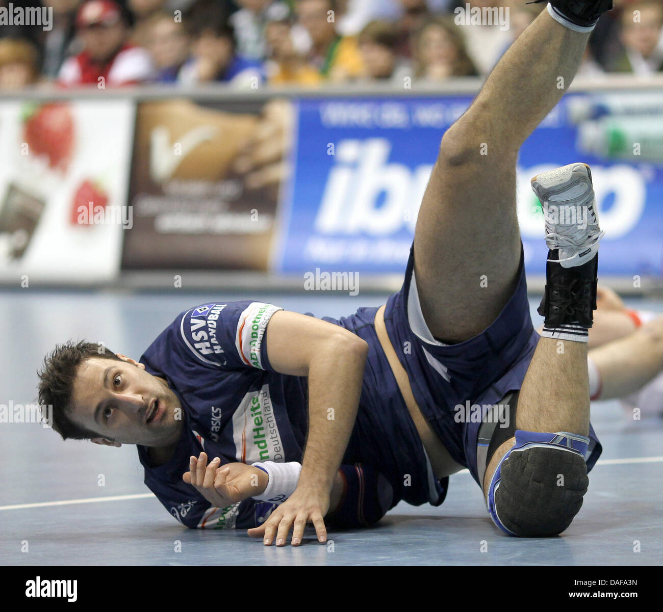 Hamburg S Igor Vori Lies On The Ground During A Handball