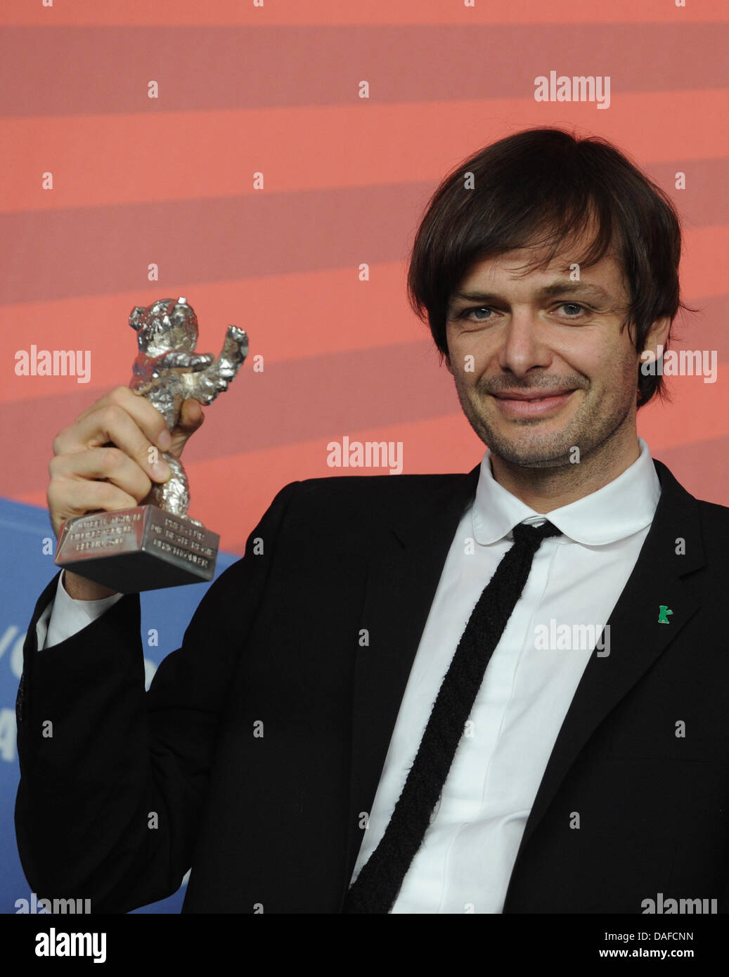 German director Ulrich Koehler poses with the Award for Best Director