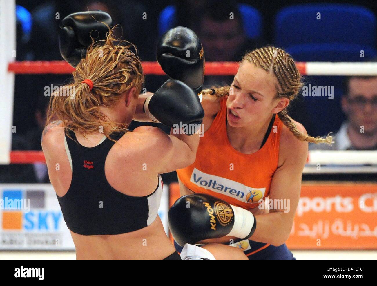 German kickboxer and WKA World Champion Christine Theiss (R) boxes with