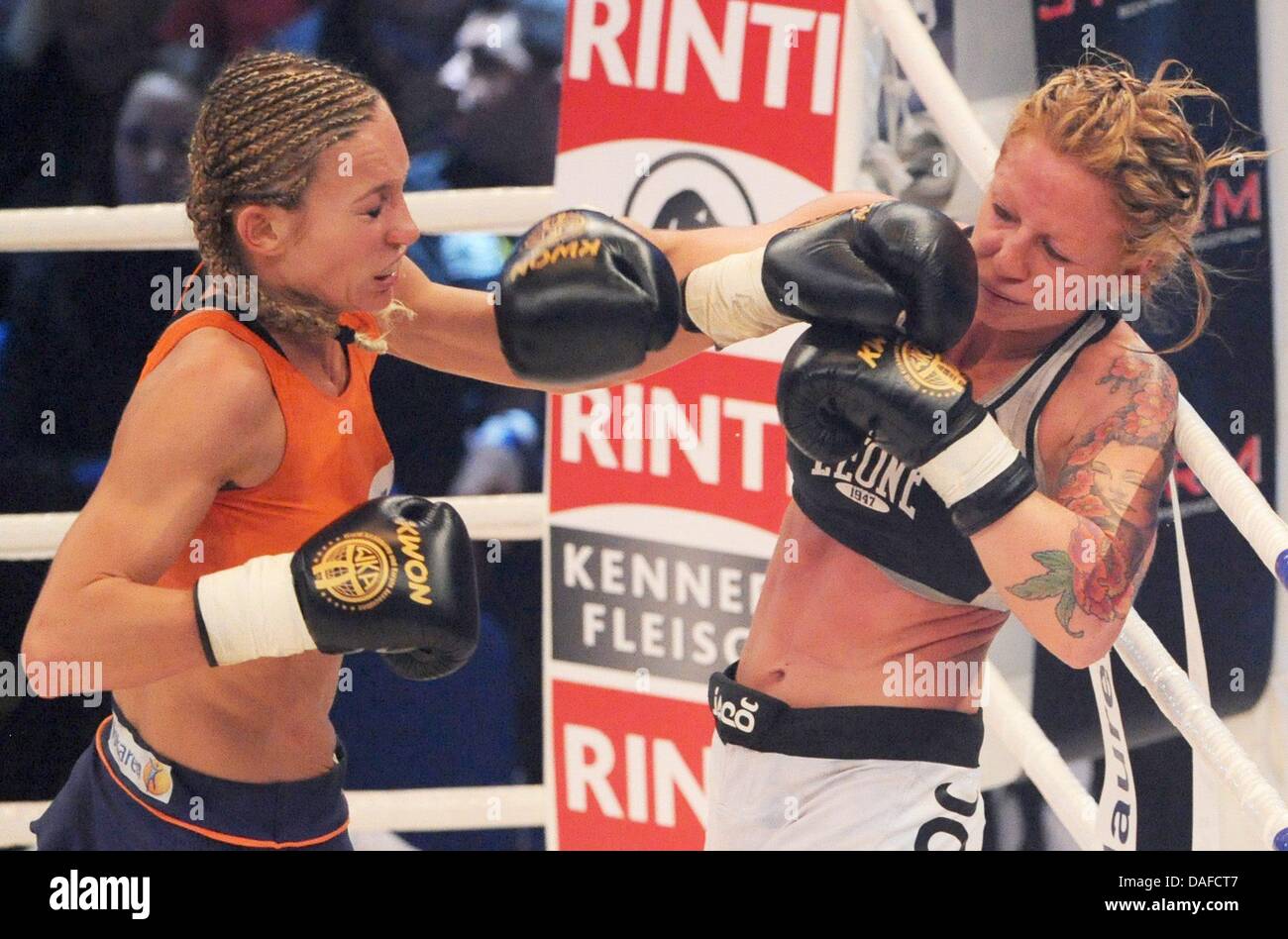 German kickboxer and WKA World Champion Christine Theiss (L) boxes with