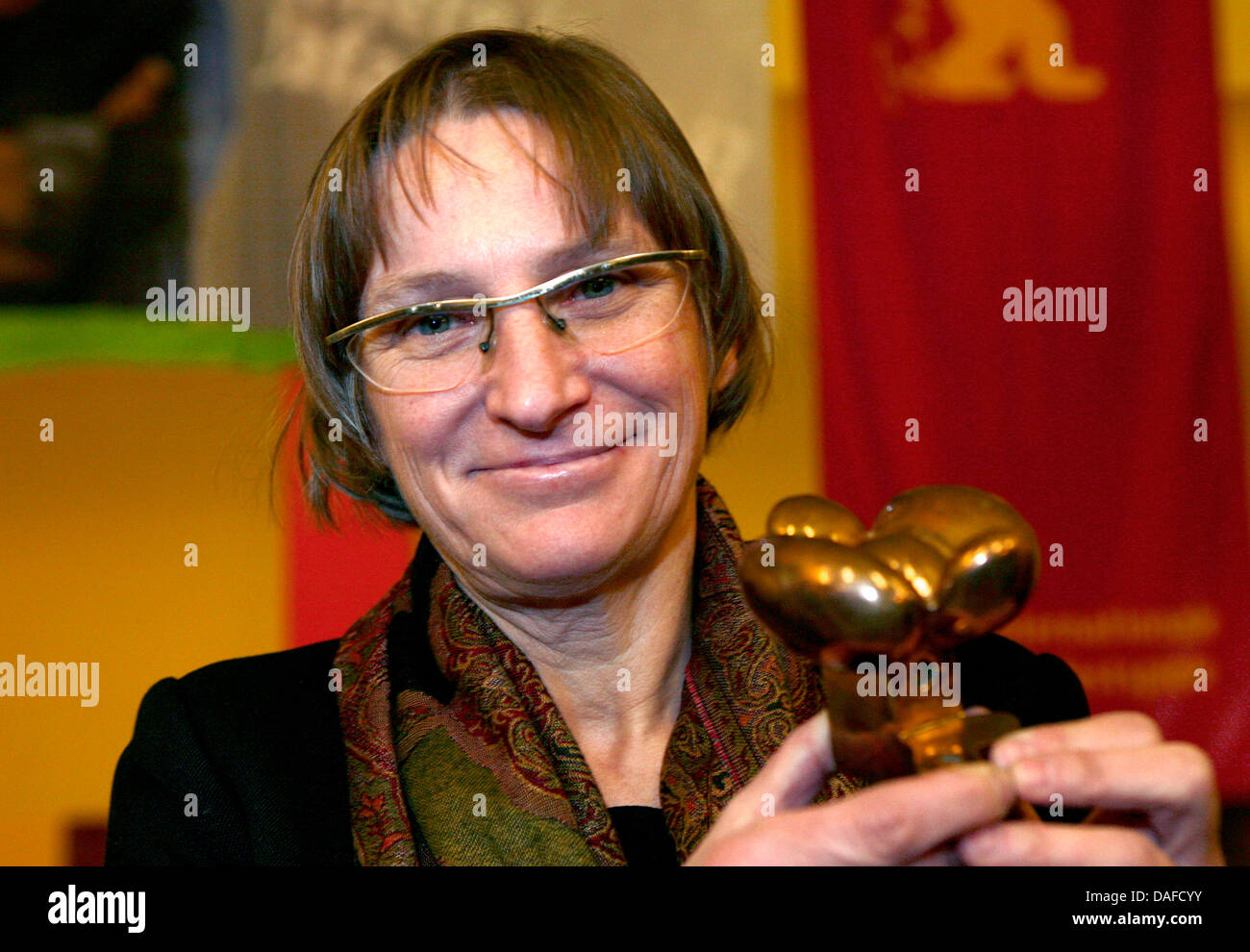 Dorota Kedzierzawska shows the Peace Film Prize in Babylon Kino in Berlin, Germany, 20 February 2011. The Polish director recieved the prize on the last day of the 61st Berlin International Film Festival for her film 'Jutro bedzie lepiej' (Tomorrow will be better). Photo: FLORIAN SCHUH Stock Photo