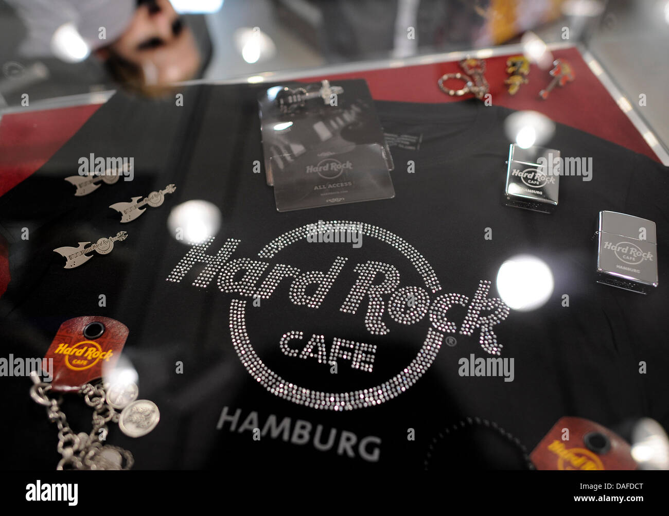 Memorabilia with the logo of the Hard Rock Cafe are on display in the window of the Hard Rock Cafe's shop in Hamburg, Germany, 21 February 2011. The Hamburg branch has not opened yet, but the shop is already open. Photo: FABIAN BIMMER Stock Photo