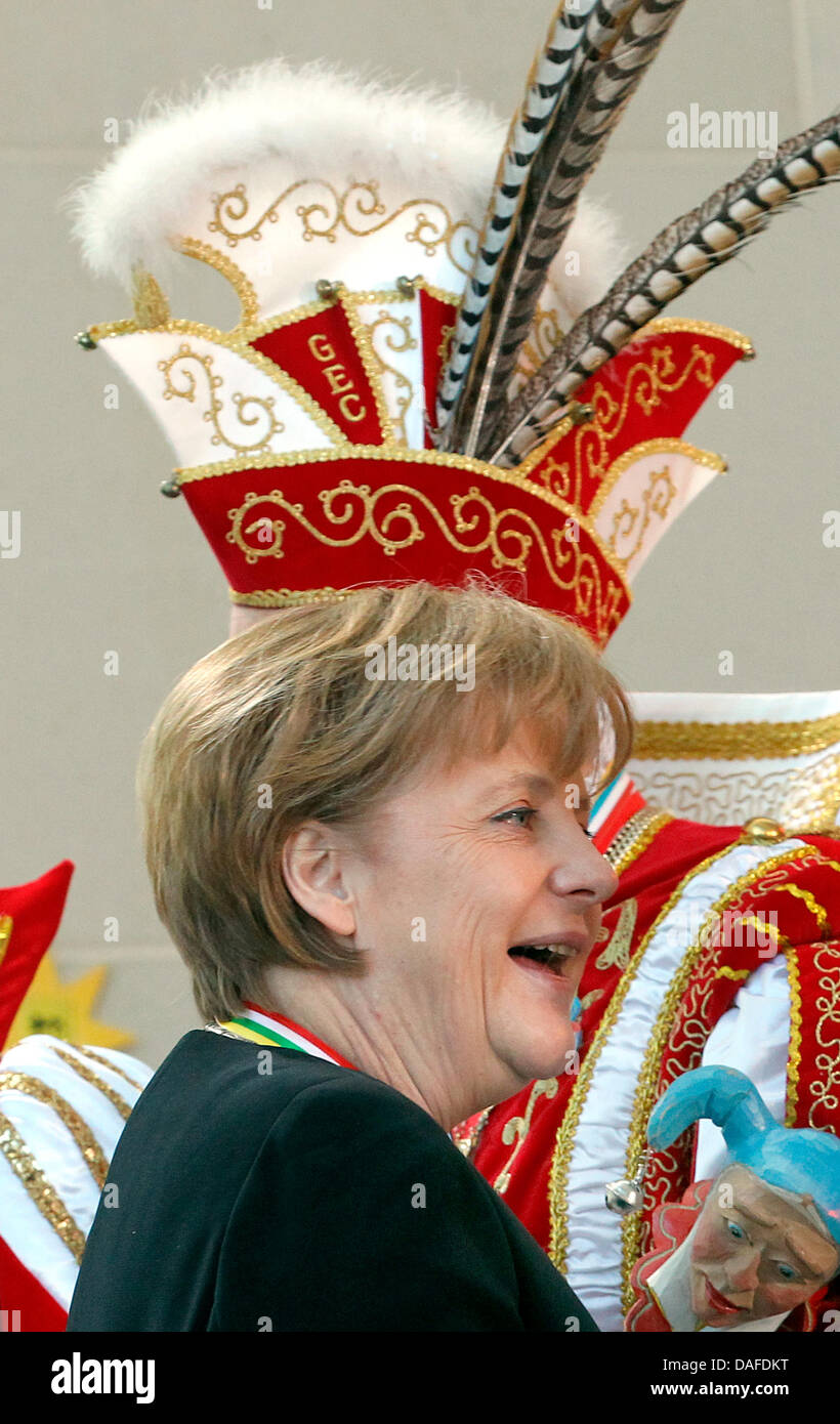 German Chancellor Angela Merkel (C) receives members of German carnival associations in Berlin, Germany, 22 February 2011. Photo: Wolfgang Kumm Stock Photo