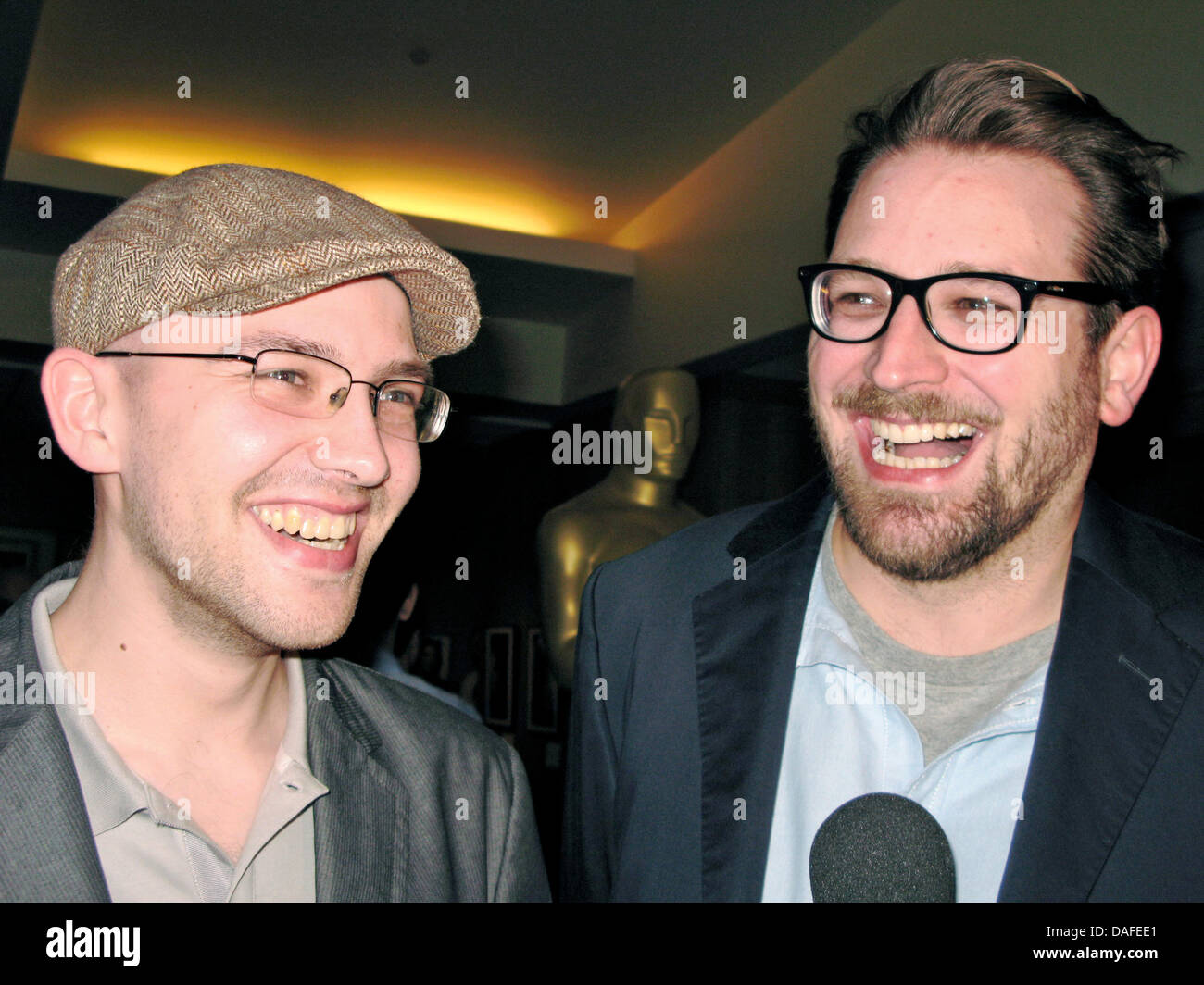 German filmmakers Max Lang (L) and Jakob Schuh smile during a reception for the Academy Awards nominees in Los Angeles, USA, 22 February 2011. Their short film 'The Gruffalo' is nominated in the category 'Short Film  (Animated)'. Photo: Barbara Munker Stock Photo
