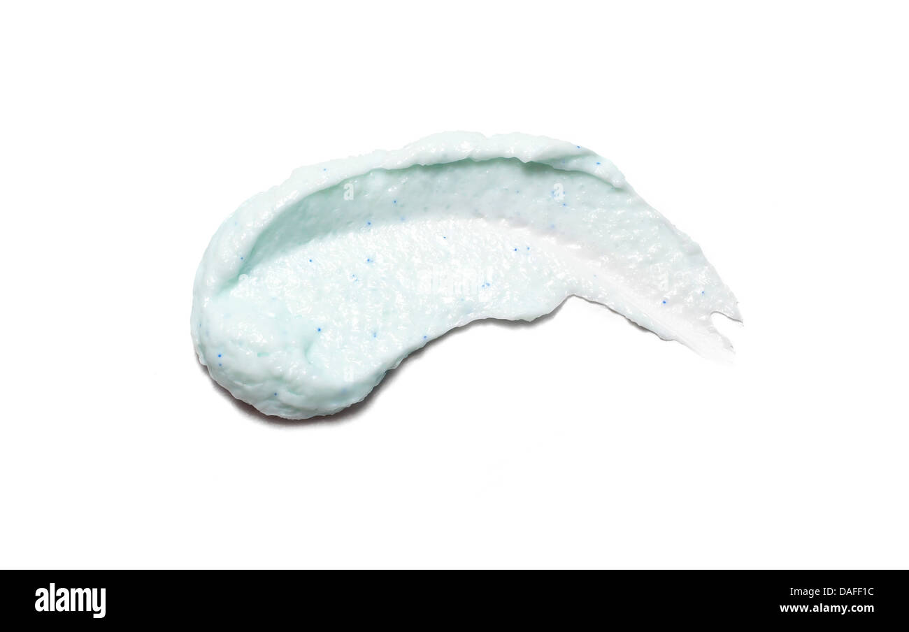 green/blue body face cream cut out onto a white background Stock Photo