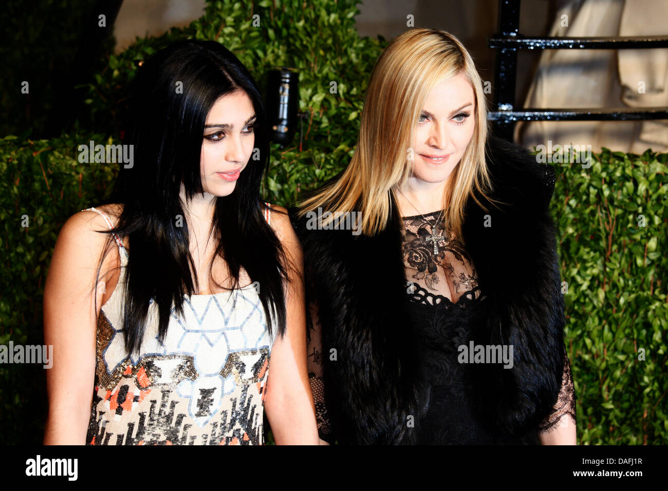 US pop star Madonna (R) and her daughter Lourdes Leon arrive at the Vanity Fair Academy Awards Party at Sunset Tower in Los Angeles, USA, 27 February 2011. Photo: Hubert Boesl Stock Photo