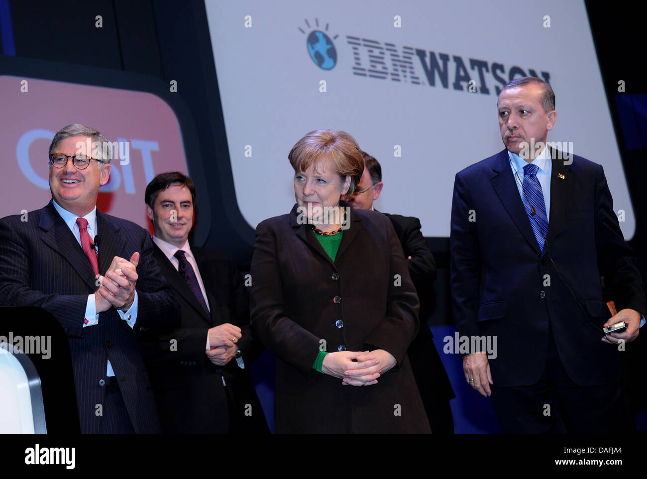 German Chancellor Angela Merkel (3-l), the head of IBM Sam Palmisano (l-r), Lower Saxony's Prime Minister David Mc Allister, the first mayor of Hanover Stephan Weil and Turkish Prime Minister Recep Tayyip Erdogan attend the inauguration of the Cebit Computer Expo in front of the supercomputer Watson in Hanover, Germany, 28 February 2011. Cebit will present over 4200 companies from  Stock Photo