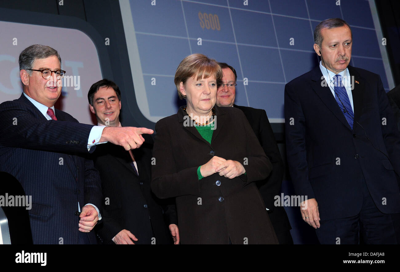 German Chancellor Angela Merkel, the head of IBM Sam Palmisano (l-r), Lower Saxony's Prime Minister David Mc Allister, the first mayor of Hanover Stephan Weil and Turkish Prime Minister Recep Tayyip Erdogan attend the inauguration of the Cebit Computer Expo in front of the supercomputer Watson in Hanover, Germany, 28 February 2011. Cebit will present over 4200 companies from about  Stock Photo