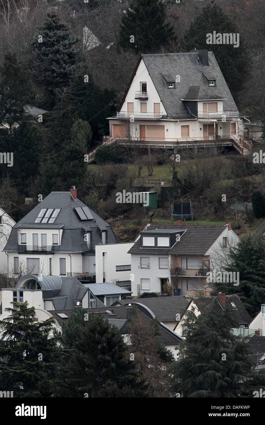 The shutters of most houses are closed during the diffusion of a blockbuster bomb in Koblenz, Germany, 04 December 2011. 45,000 Koblenz residents have to be evacuated during the defusing of a bomb in the Rhine river. Photo: Fredrik von Erichsen Stock Photo