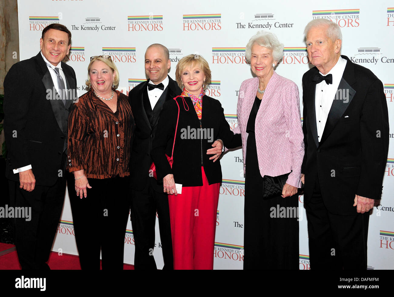 From left to right: United States Representative John Mica (Republican of Florida), wife, Patricia, Robert Bernstein, Florence Henderson, Marjorie Billington, and James H. Billington, the Librarian of Congress, arrive for the formal Artist's Dinner honoring the recipients of the 2011 Kennedy Center Honors hosted by United States Secretary of State Hillary Rodham Clinton at the U.S. Stock Photo