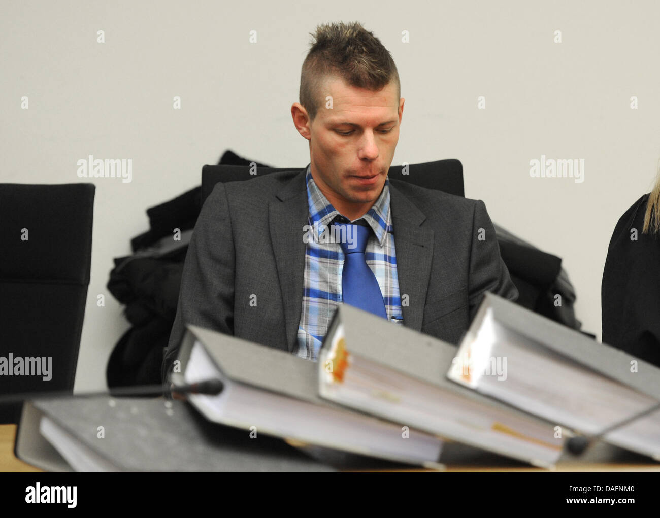 German Football association (DFB) referee Michael Kempter sits behind ...