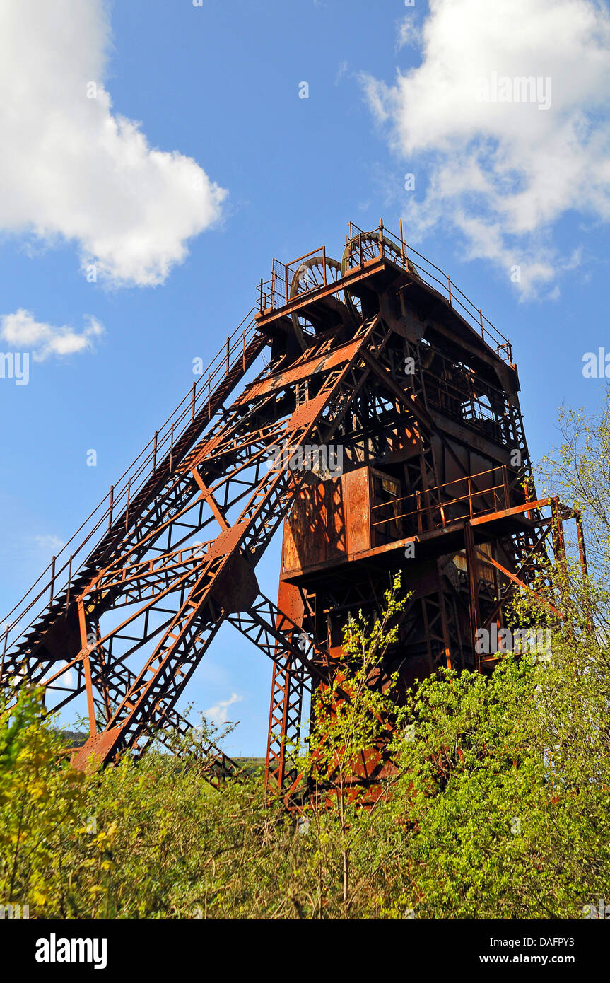 old mine shaft lifting gear rusting away, United Kingdom, Wales, Rhondda Valley Stock Photo