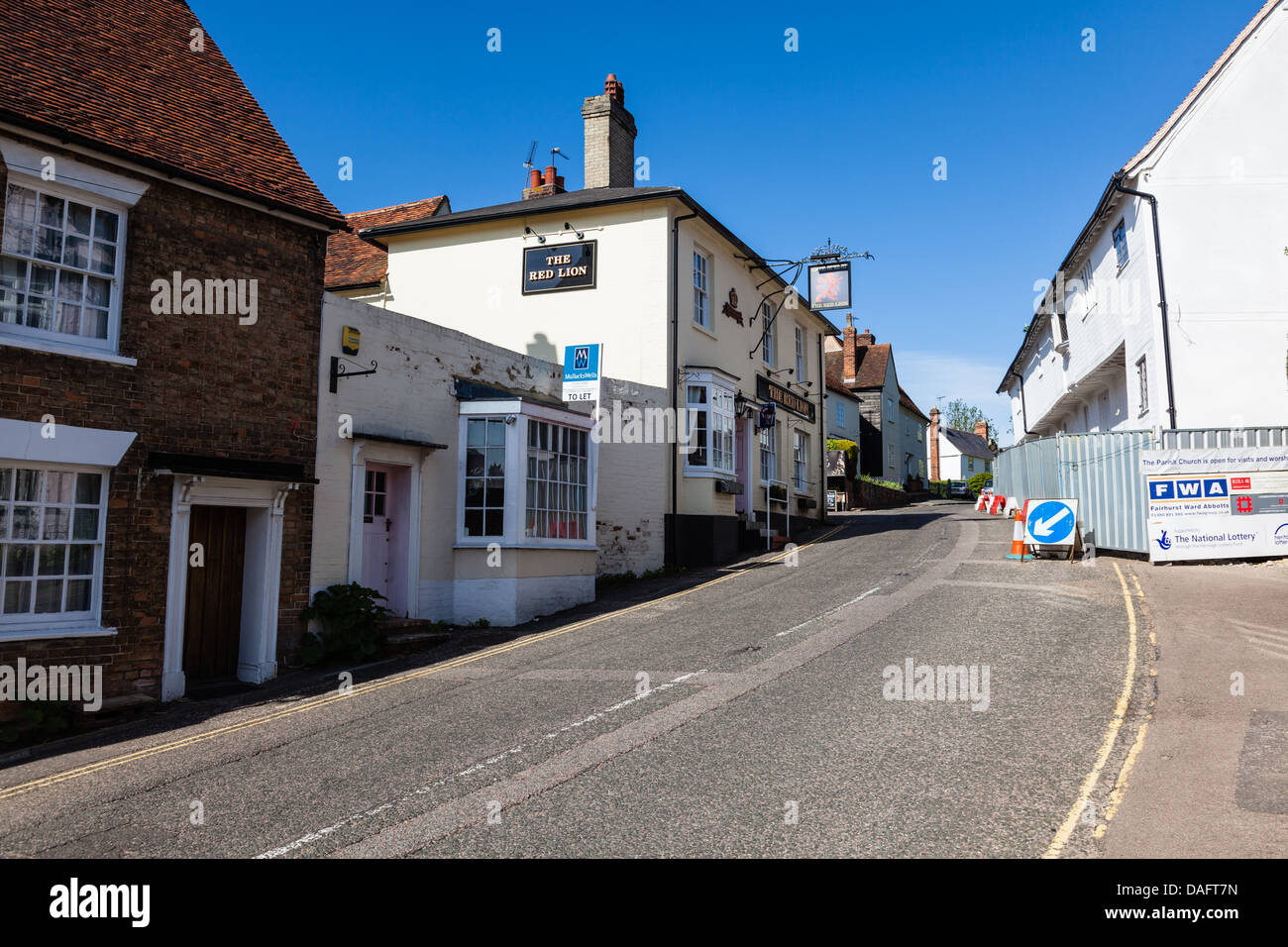 The Red Lion pub and road work for restoration of historic property on