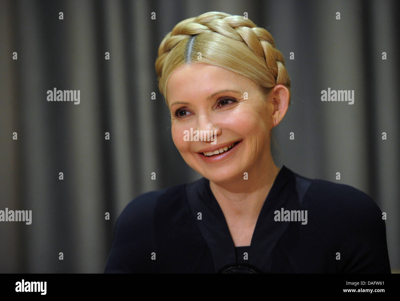 Former head of the Ukrainian government and current leader of the opposition, Yulia Tymoshenko, smiles in Kiev, Ukraine, 2 March 2011. Photo: HANNIBAL Stock Photo