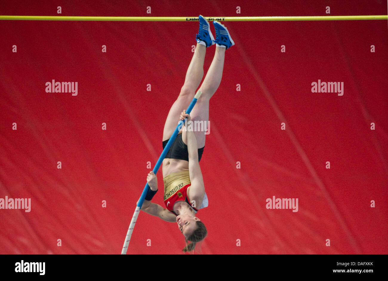 Germany's Lisa Ryzih competes in the pole vault qualifications of the