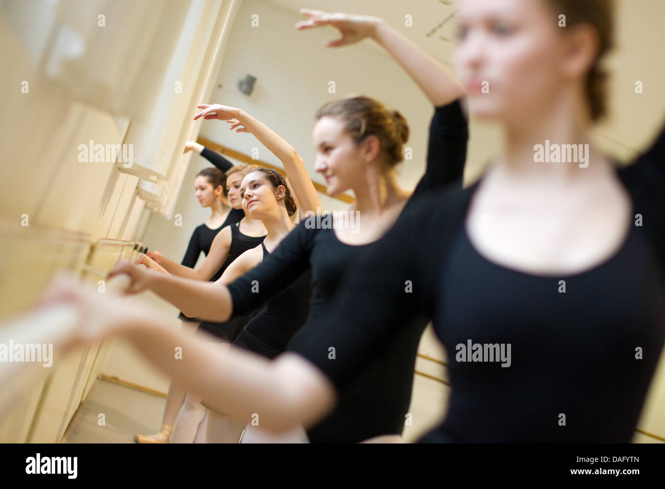 Ballet students practice in Muenster, Germany, 24 February 2011. Ballet