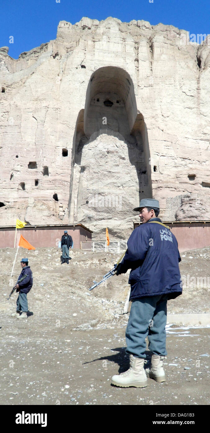 The picture shows an Afghan soldier securing a celebration for the 10th anniversary of the destruction of the Buddha Statues in the region Bamian in Central-Afghanistan on 07 March 2011. The 54-meter tall Buddha Statues which had been ben cut into the rocks by buddhists monks in the 6th century will not be re-constructed, as the UNESCO decided last week, stated the archelogist Prof Stock Photo