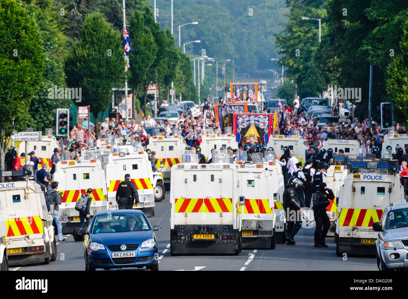 Belfast, Northern Ireland, 12th July 2013 - Hundreds of Orange Order members, bandsmen and supports are prevented from proceeding by PSNI armoured Landrovers and officers in riot gear. Credit:  Stephen Barnes/Alamy Live News Stock Photo