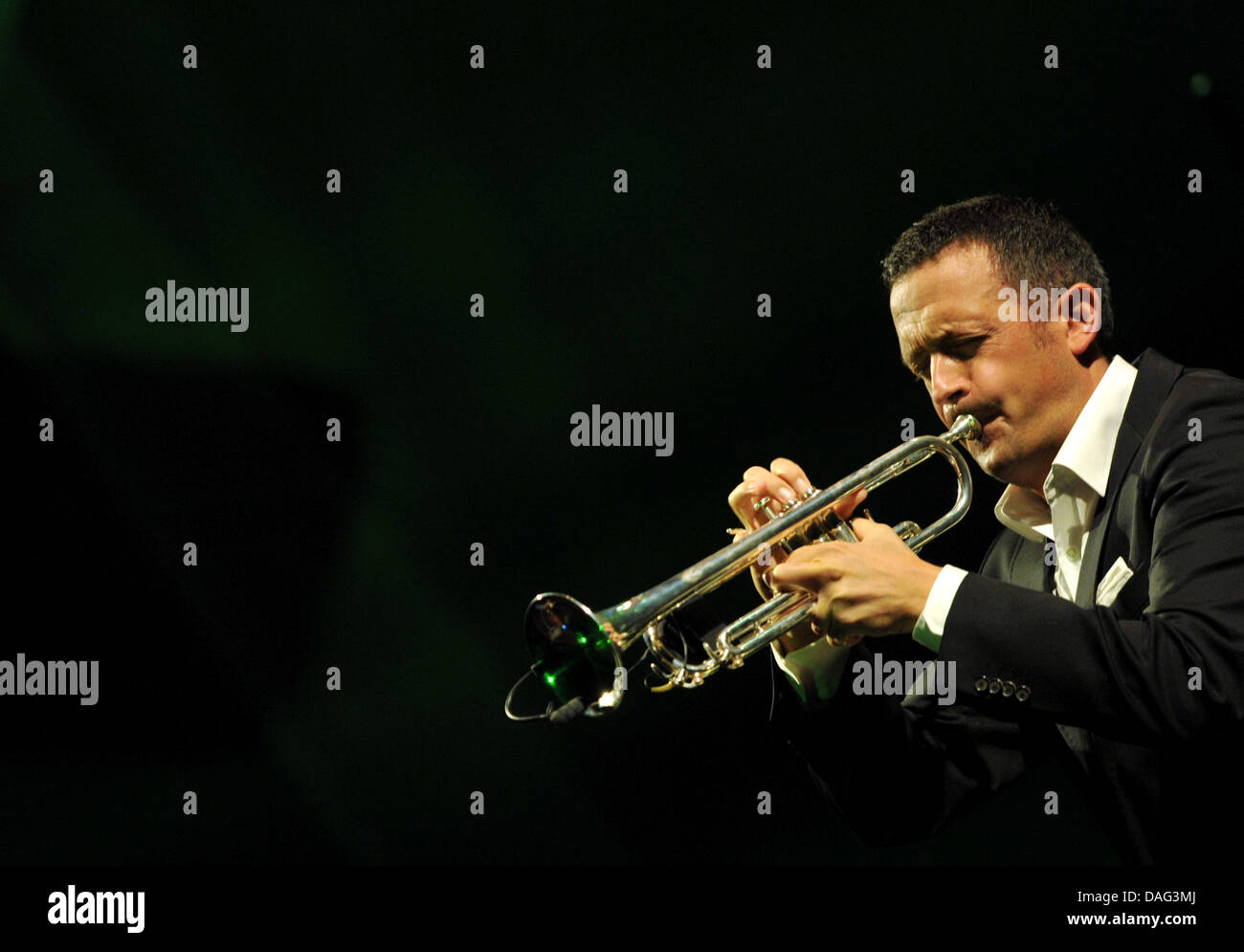 German jazz musician Till Broenner plays on his trumpet during the first performance of his Germany tour in Frankfurt, Germany, 15 March 2011. Broenner presented his new album 'At the End of the Day'. Photo: Arnde Dedert Stock Photo