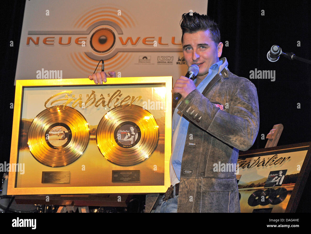 Austrian singer Andreas Gabalier receives gold records at a meeting of Koch Universal Music in Munich, Germany, 17 March 2011. Photo: Volker Dornberger Stock Photo