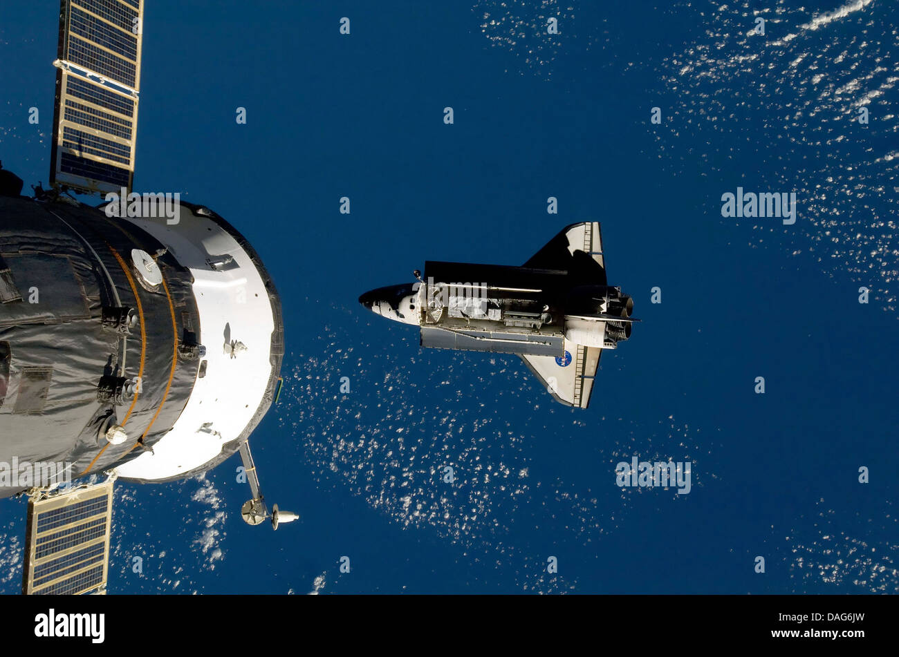 International Space Station and space shuttle. Optimised and enhanced version of an original NASA image Stock Photo