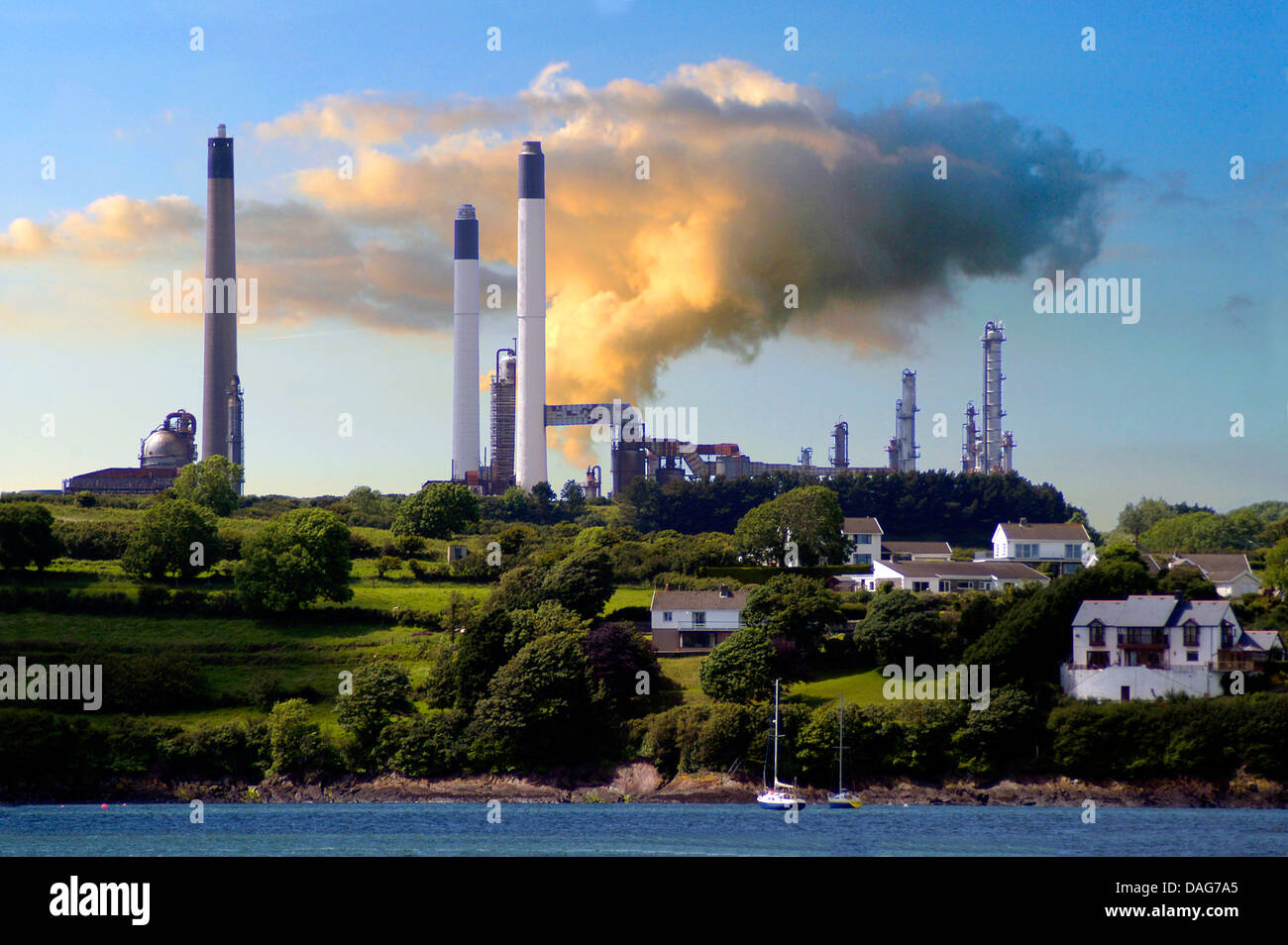 lng terminal and oil raffinerie in evening light, United Kingdom, Wales, Waterson/Milford Haven Stock Photo