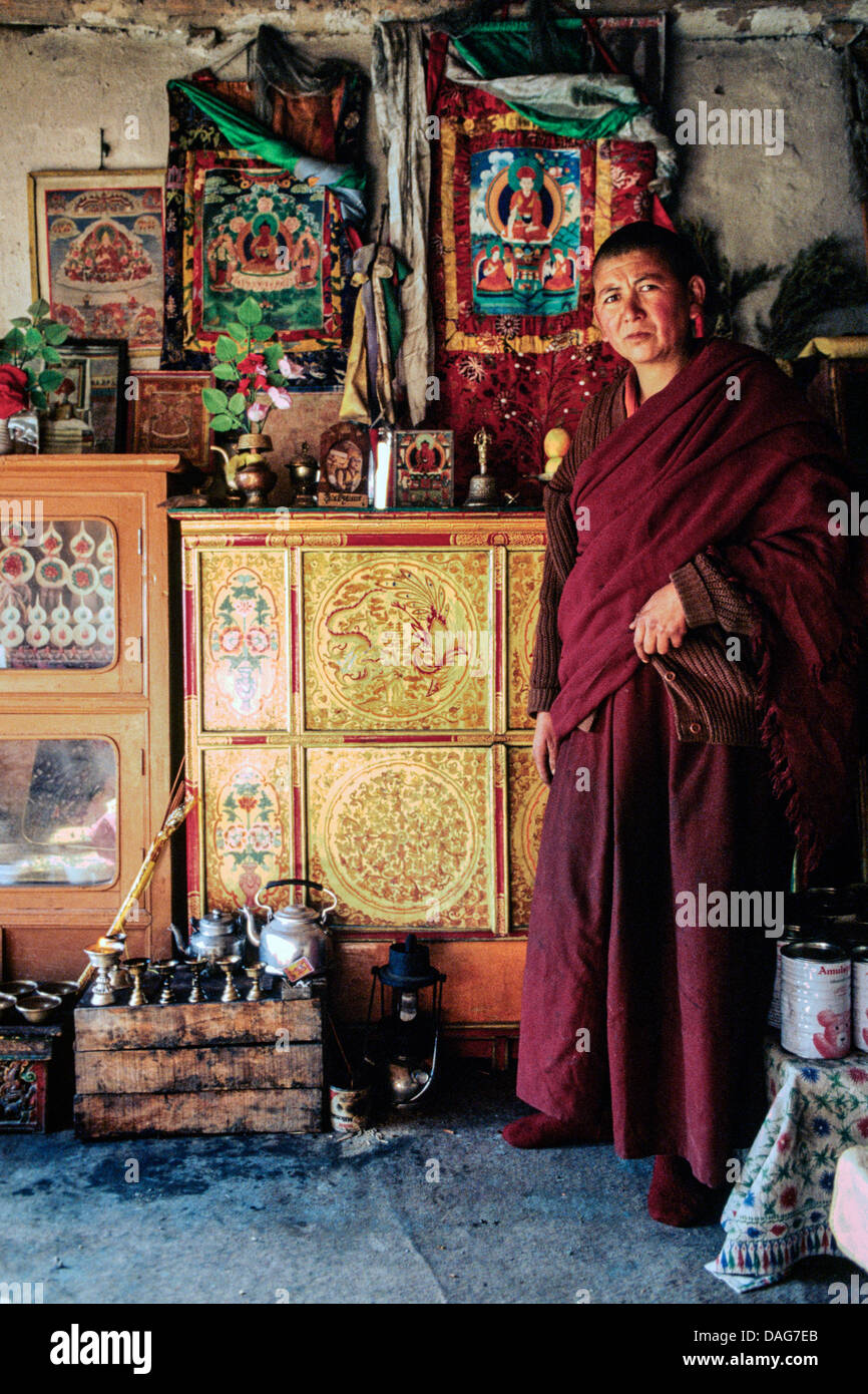 Buddhist nun in her room in a monastery, Ladakh. India Stock Photo