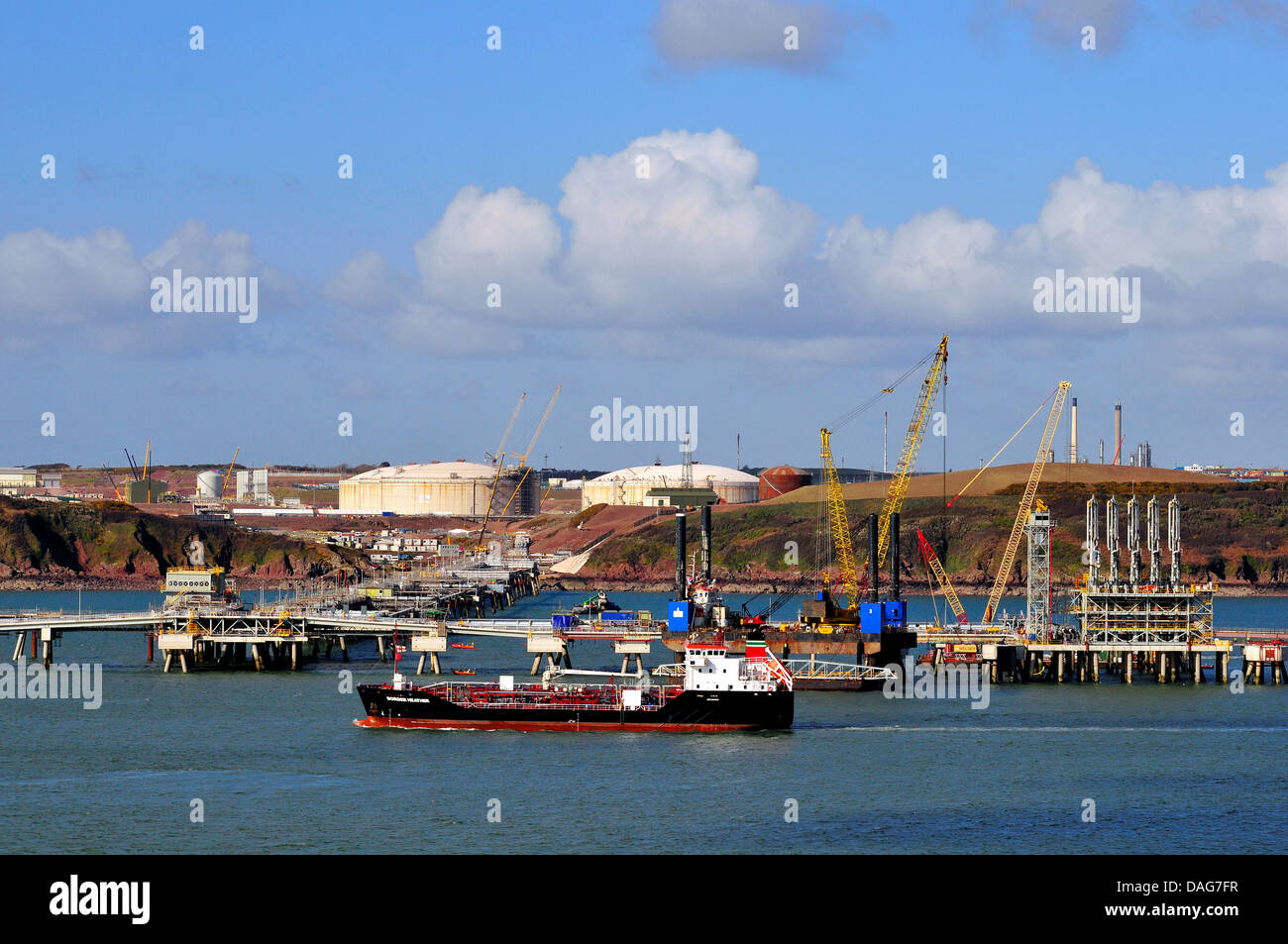sea jetty at the harbour of a gas terminal, United Kingdom, Wales Stock Photo