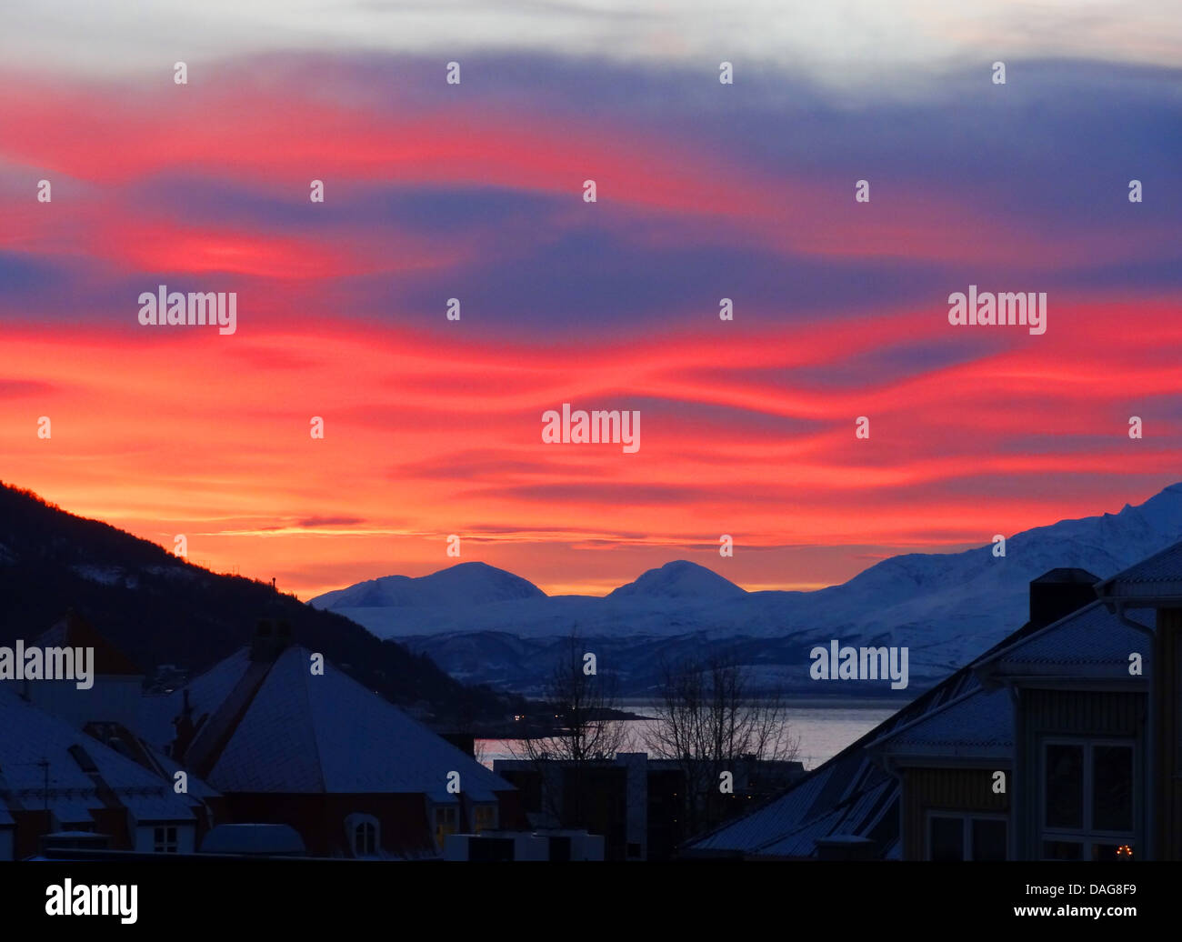red sky over the Balsfjord at polar noon , Norway, Troms, Tromsoe, Malangen Stock Photo