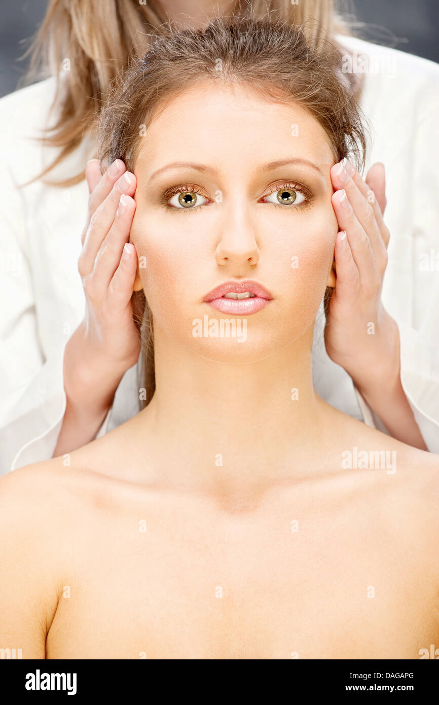 Pretty woman on head massage treatment Stock Photo