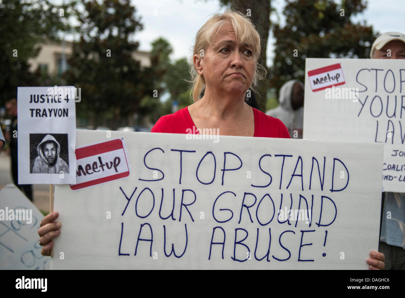 Sanford, Florida, USA. 12th July 2013. Protestors outside the Seminole County Courthouse while the jury deliberates in the trial of George Zimmerman, Zimmerman was charged in 2012 for the shooting death of Trayvon Martin in Sanford, FL. Credit:  Cal Sport Media/Alamy Live News Stock Photo