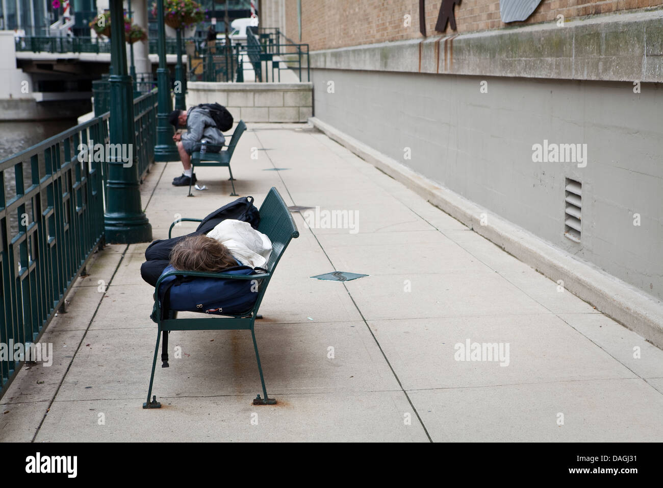 Sleep on bench hi-res stock photography and images - Alamy