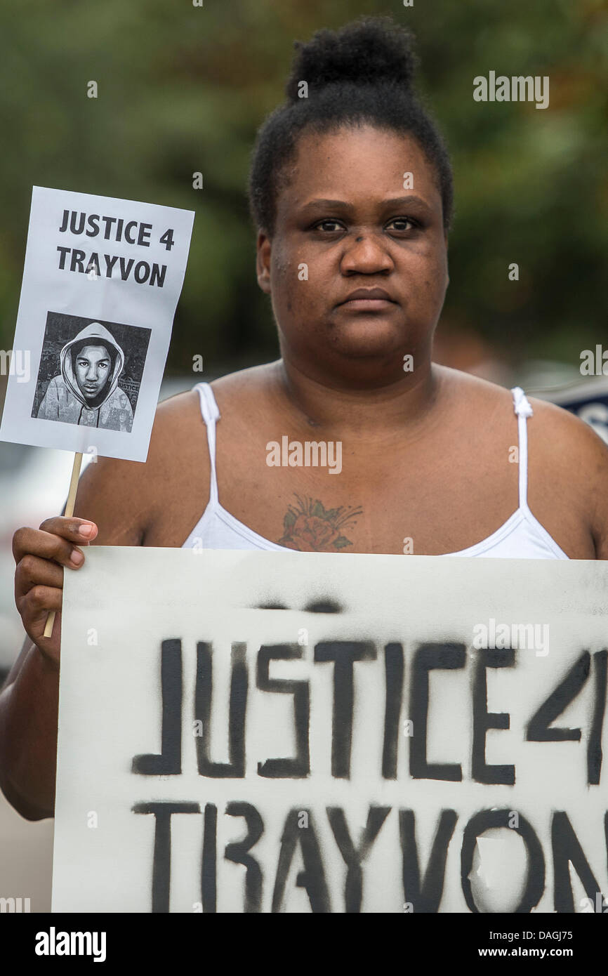 Sanford, Florida, USA. 12th July 2013. Protestors outside the Seminole County Courthouse while the jury deliberates in the trial of George Zimmerman, Zimmerman was charged in 2012 for the shooting death of Trayvon Martin in Sanford, FL. Credit:  Cal Sport Media/Alamy Live News Stock Photo
