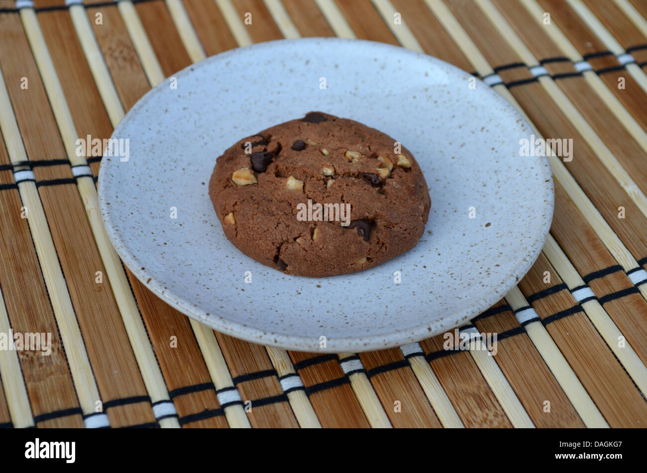 Single cookie on a plate Stock Photo
