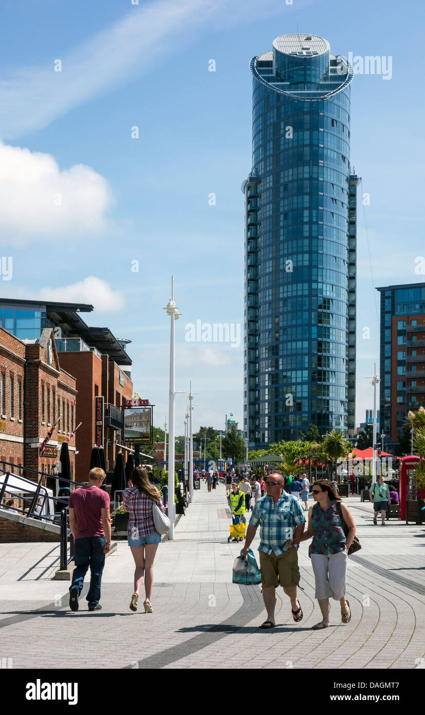Gunwharf Quays Shopping Centre Portsmouth. No.1 Gunwharf Quays Apartment Tower in the Background. Stock Photo