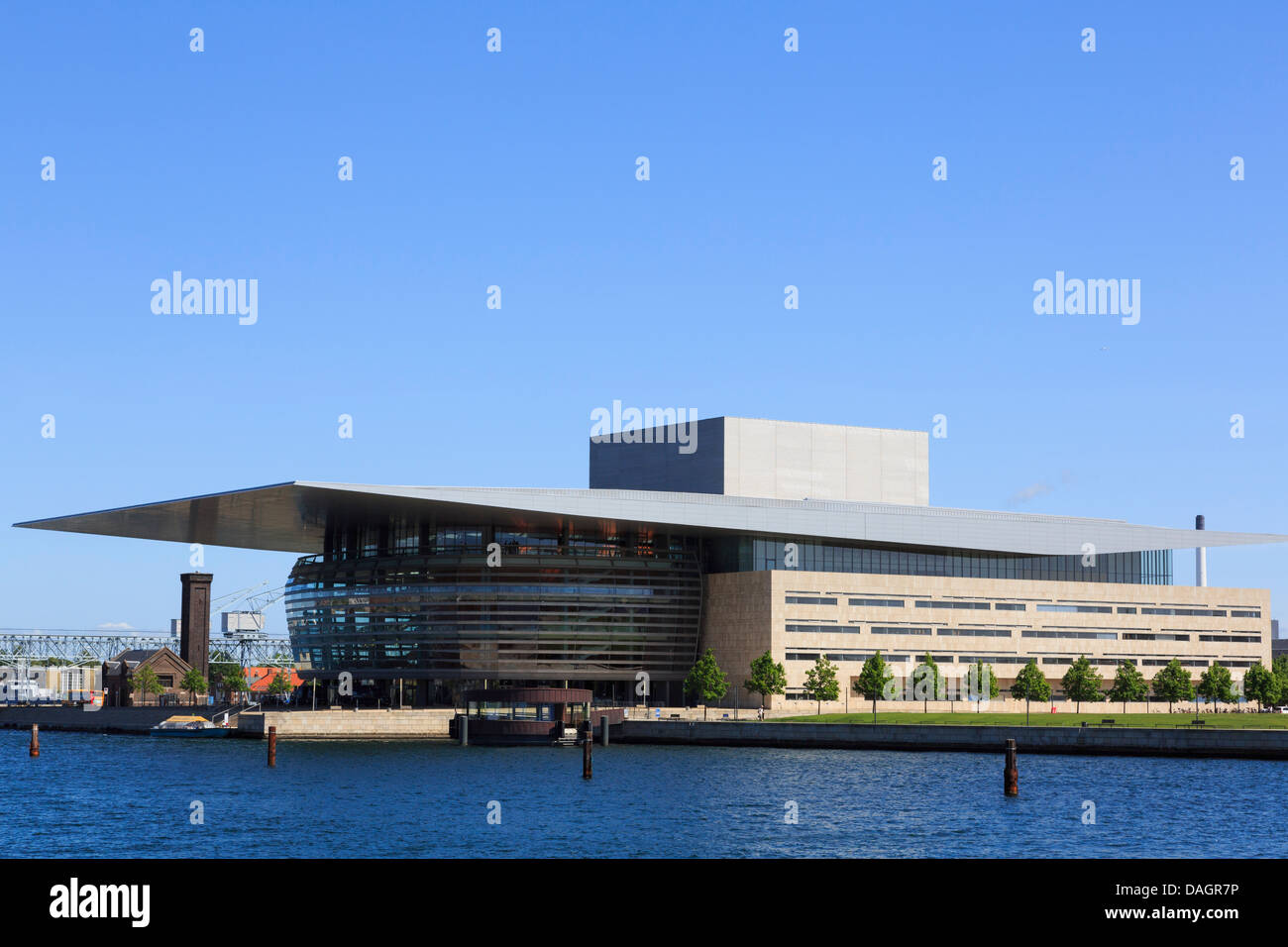 Offshore view across harbour to Opera House on waterfront in Christianshavn, Copenhagen, Amager, Denmark Stock Photo