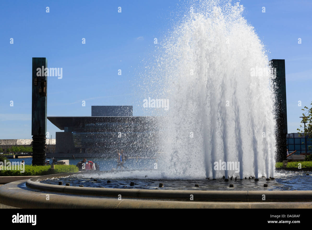 Fountain in Amaliehaven or The Amalie Gardens on waterfront with Opera House across the harbour in Copenhagen Zealand Denmark Stock Photo