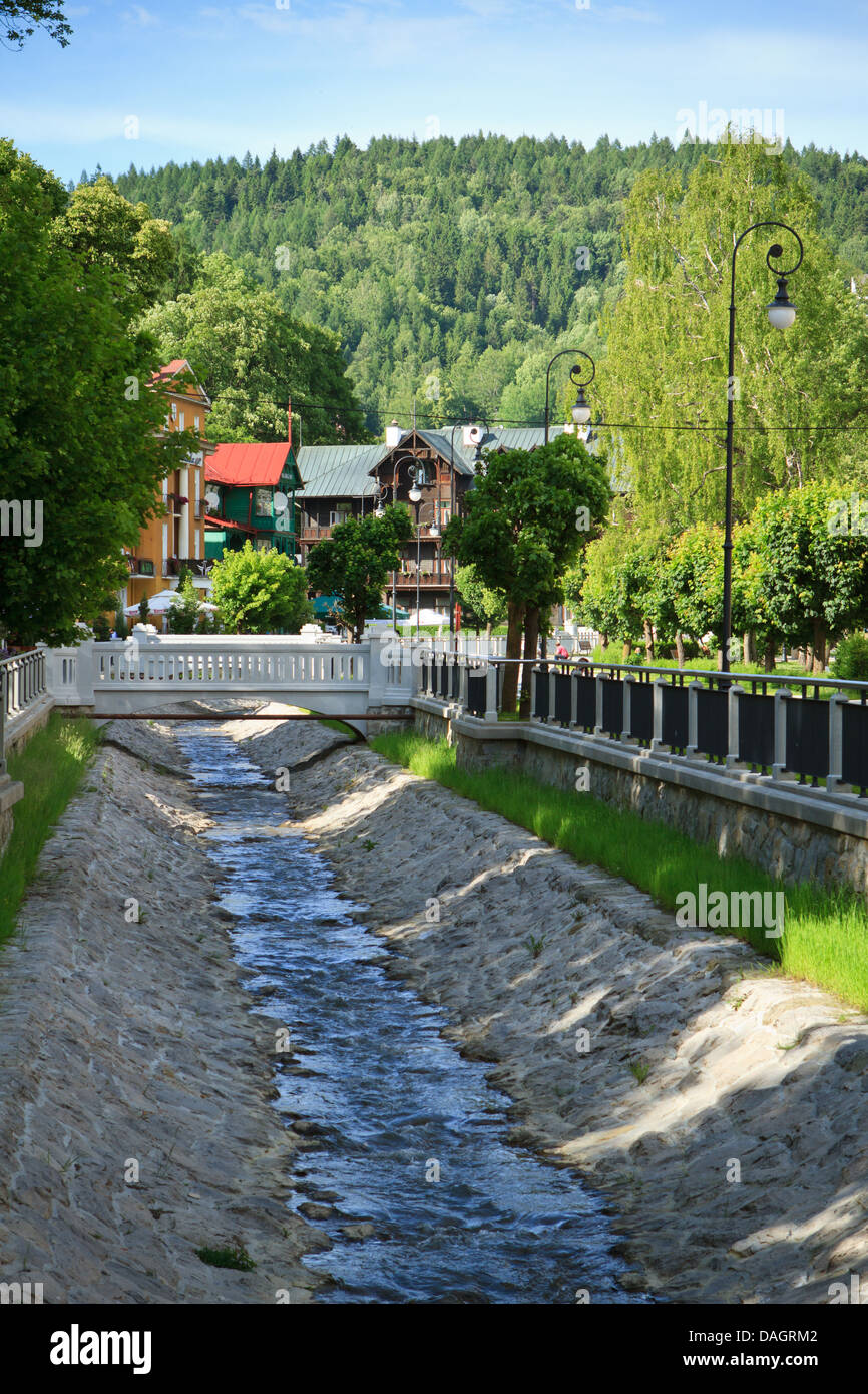 Kryniczanka stream near Dietl boulevard in Krynica-Zdroj - resort and spa in Beskidy mountains, southern Poland. Stock Photo