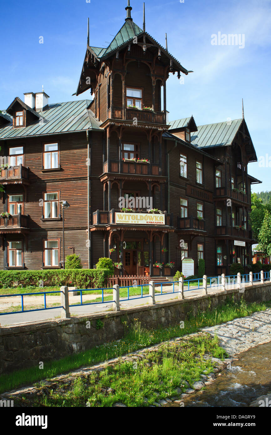 Pension 'Witoldowka'. Old wooden architecture of Krynica-Zdroj - resort and spa in Beskidy mountains, southern Poland. Stock Photo
