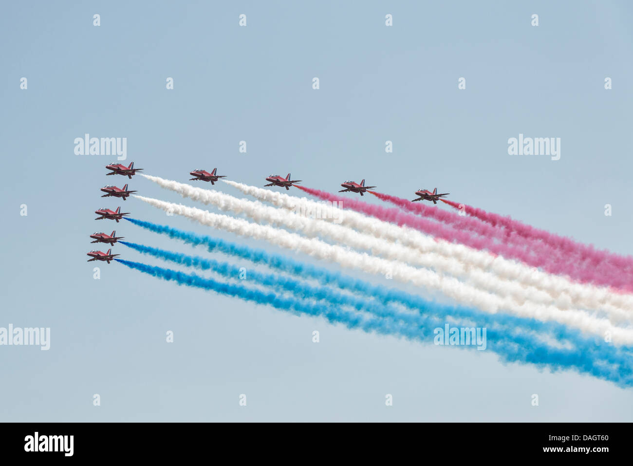 The British Royal Air Force Red Arrows Military Aerobatic Display Team arrive at RAF Waddington in Big Battle Formation Stock Photo