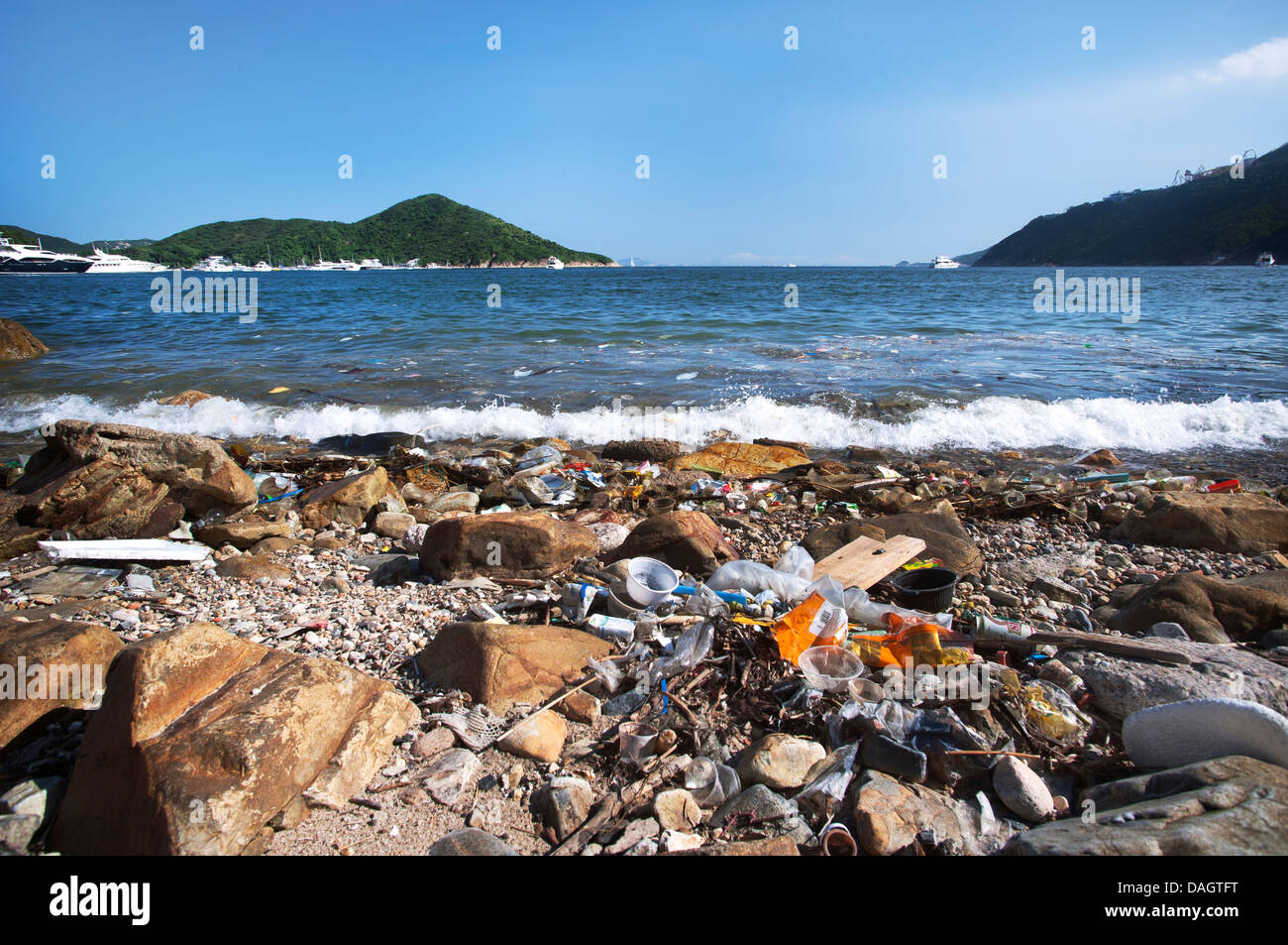 Trash washes up on the shore of Hong Kong Island's Southern District Stock Photo